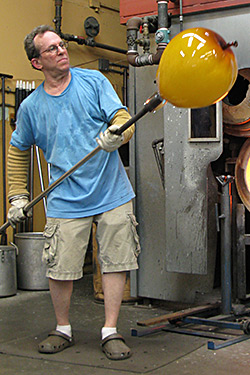 Michael Cohn with Giant Glass Apple, Cohn-Stone Studios